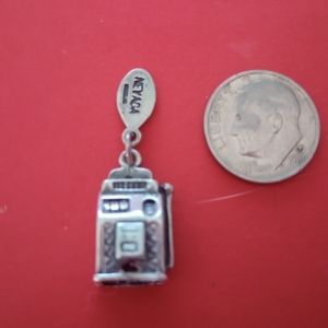 Nicely detailed vintage Sterling Silver Las Vegas Nevada  machine charm.